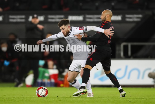 080122 - Swansea City v Southampton, FA Cup - Ryan Manning of Swansea City is tackled by Nathan Redmond of Southampton