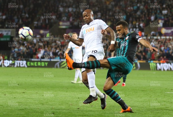 080518 - Swansea City v Southampton, Premier League - Andre Ayew of Swansea City challenges Ryan Bertrand of Southampton for the ball