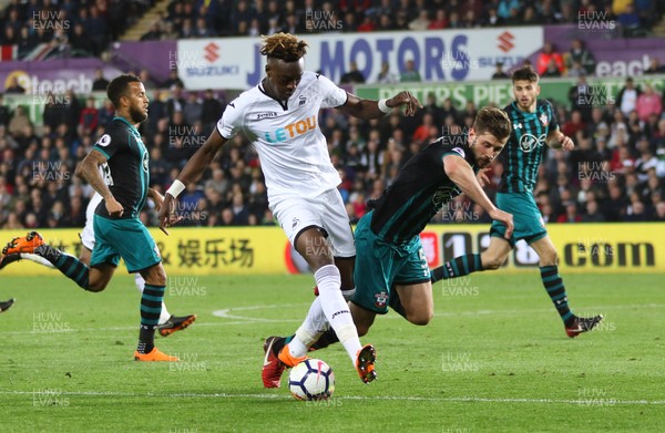 080518 - Swansea City v Southampton, Premier League - Tammy Abraham of Swansea City brushes off the challenge from Jack Stephens of Southampton