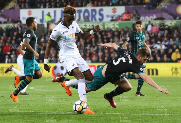 080518 - Swansea City v Southampton, Premier League - Tammy Abraham of Swansea City brushes off the challenge from Jack Stephens of Southampton