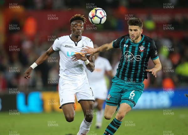 080518 - Swansea City v Southampton, Premier League - Tammy Abraham of Swansea City and Wesley Hoedt of Southampton compete for the ball