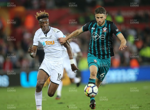 080518 - Swansea City v Southampton, Premier League - Tammy Abraham of Swansea City and Wesley Hoedt of Southampton compete for the ball