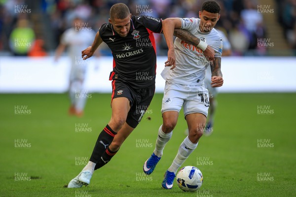 180426 - Swansea City v Southampton - Sky Bet Championship - Gustavo Nunes of Swansea City battles for the ball with Nathan Wood of Southampton