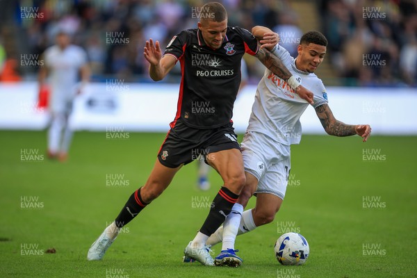 180426 - Swansea City v Southampton - Sky Bet Championship - Gustavo Nunes of Swansea City battles for the ball with Nathan Wood of Southampton