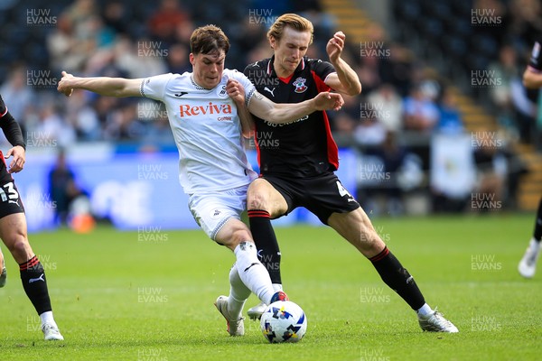 180426 - Swansea City v Southampton - Sky Bet Championship - Sam Parker of Swansea City battles for the ball with Flynn Downes of Southampton