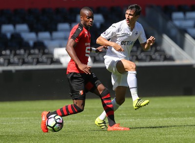 060816 -  Swansea City v Stade Rennais, Pre-season Friendly - Jack Cork of Swansea City plays the ball forward