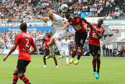 060816 -  Swansea City v Stade Rennais, Pre-season Friendly - Jay Fulton of Swansea City heads to score goal