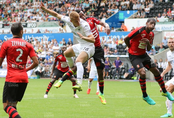 060816 -  Swansea City v Stade Rennais, Pre-season Friendly - Jay Fulton of Swansea City heads to score goal