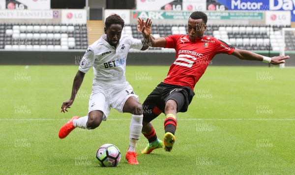 060816 -  Swansea City v Stade Rennais, Pre-season Friendly - Nathan Dyer of Swansea City is challenged by Edson Mexer of Stade Rennais