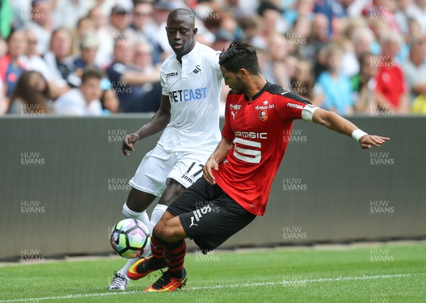 060816 -  Swansea City v Stade Rennais, Pre-season Friendly - Modou Barrow of Swansea City is challenged by   Pedro Mendes of Stade Rennais