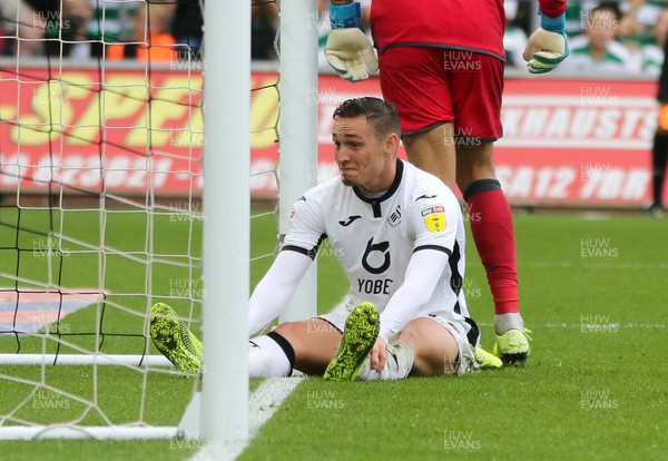 051019 - Swansea City v Stoke City, SkyBet Championship - Connor Roberts of Swansea City is left sat on the goal line after failing to take his chance to score