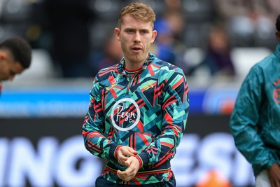 070326 - Swansea City v Stoke City - Sky Bet Championship - Ollie Cooper of Swansea City warming up before game