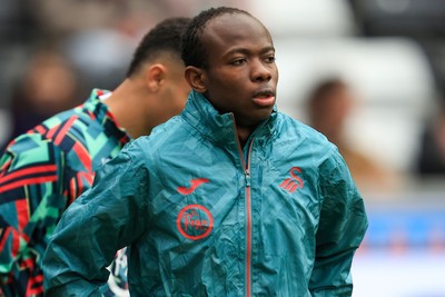 070326 - Swansea City v Stoke City - Sky Bet Championship - Malick Yalcouye of Swansea City warming up before game