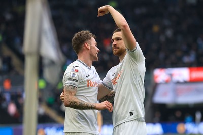 070326 - Swansea City v Stoke City - Sky Bet Championship - Zan Vipotnik of Swansea City celebrates after scoring with Josh Tymon of Swansea City