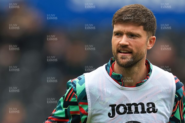 070326 - Swansea City v Stoke City - Sky Bet Championship - Cameron Burgess of Swansea City warming up before game
