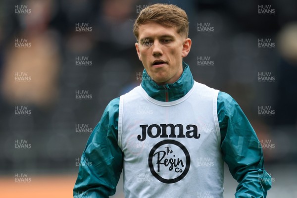 070326 - Swansea City v Stoke City - Sky Bet Championship - Ethan Galbraith of Swansea City warming up before game