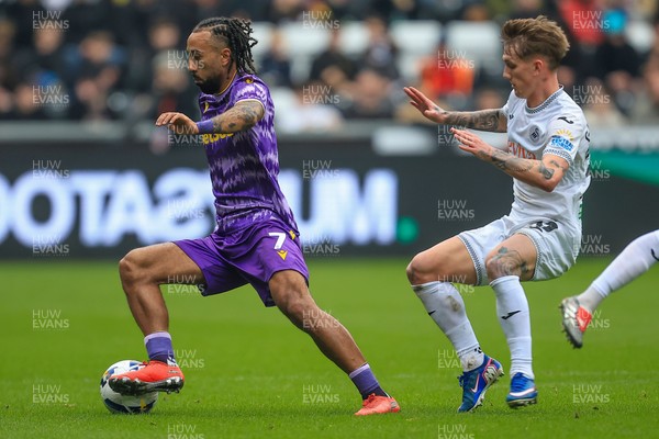 070326 - Swansea City v Stoke City - Sky Bet Championship - Sorba Thomas of Stoke City battles for the ball with Ethan Galbraith of Swansea City