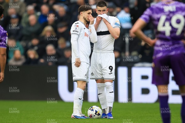 070326 - Swansea City v Stoke City - Sky Bet Championship - Liam Cullen of Swansea City an Zan Vipotnik of Swansea City