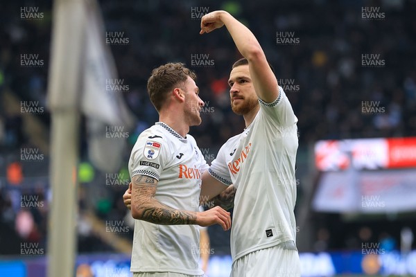 070326 - Swansea City v Stoke City - Sky Bet Championship - Zan Vipotnik of Swansea City celebrates after scoring with Josh Tymon of Swansea City