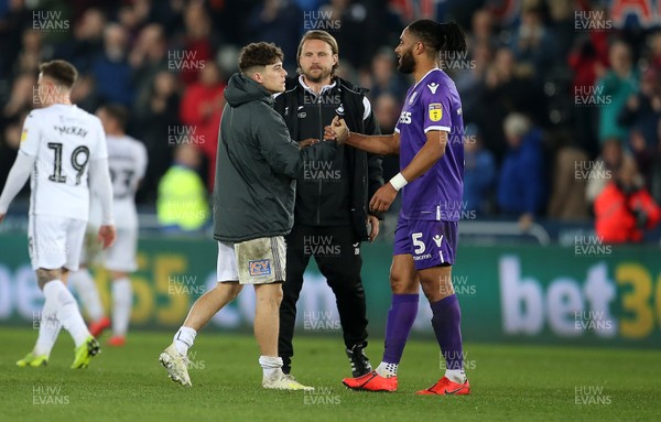 090419 - Swansea City v Stoke City - SkyBet Championship - Daniel James of Swansea City shakes hands with Ashley Williams of Stoke City at full time