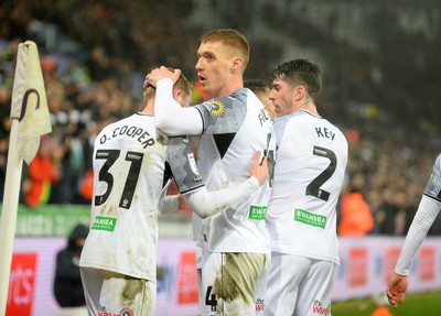 100424 - Swansea City v Stoke City - Sky Bet Championship - Swansea City teammates celebrates scoring the first goal