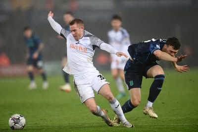 100424 - Swansea City v Stoke City - Sky Bet Championship - Ollie Cooper of Swansea City goes down in the box to earn his side a penalty