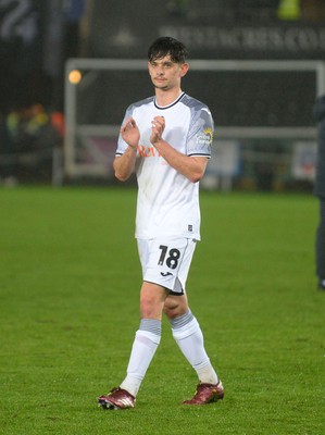 100424 - Swansea City v Stoke City - Sky Bet Championship - Charlie Patino of Swansea City applauds the fans at full time