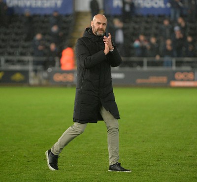 100424 - Swansea City v Stoke City - Sky Bet Championship - Luke Williams, Manager of Swansea City applauds the fans at full time