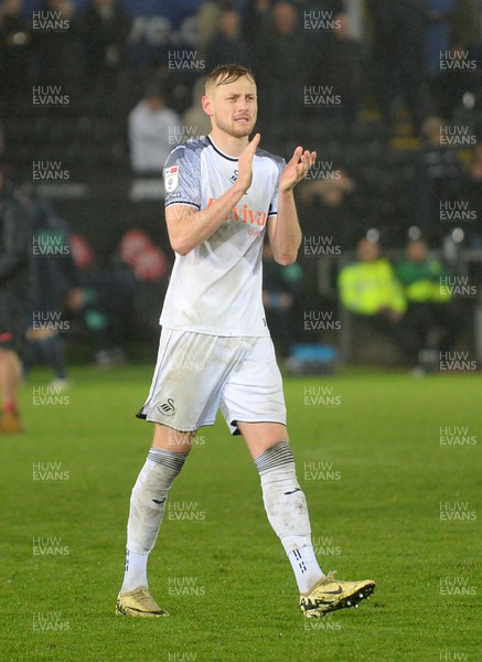 100424 - Swansea City v Stoke City - Sky Bet Championship - Harry Darling of Swansea City applauds the fans at full time