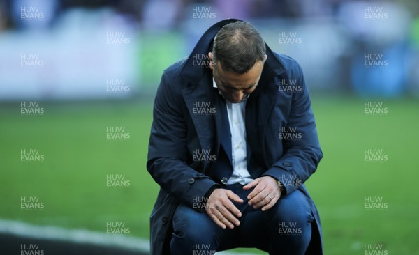 130518 - Swansea City v Stoke City, Premier League - Swansea City manager Carlos Carvalhal drops to his knees in frustration after Swansea miss a chance to score during the second half