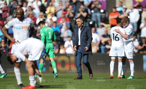 130518 - Swansea City v Stoke City, Premier League - Swansea City manager Carlos Carvalhal on the pitch with his players at the end of the match as Swansea City are relegated from the Premier League