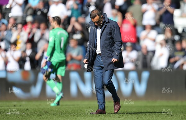 130518 - Swansea City v Stoke City, Premier League - Swansea City manager Carlos Carvalhal on the pitch with his players at the end of the match as Swansea City are relegated from the Premier League