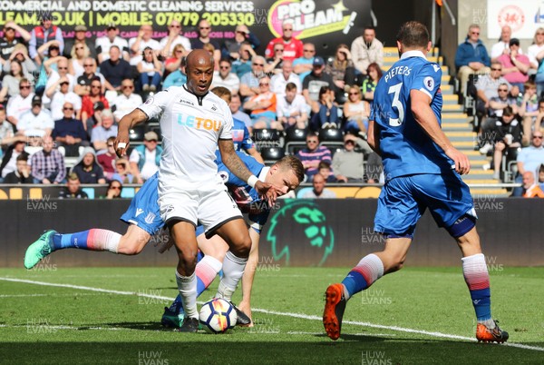 130518 - Swansea City v Stoke City, Premier League - Andre Ayew of Swansea City looks to win the ball