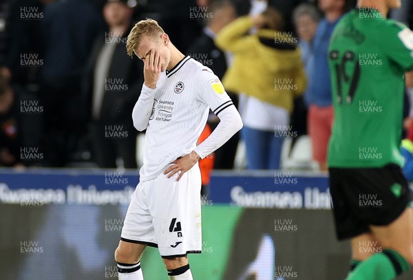 170821 - Swansea City v Stoke City - SkyBet Championship - A dejected Flynn Downes of Swansea City at full time