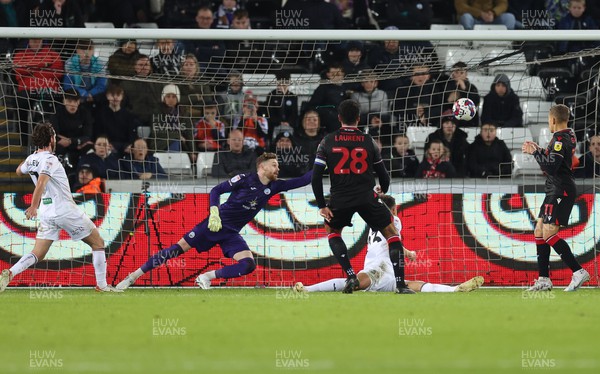 210223 - Swansea City v Stoke City, EFL Sky Bet Championship - Josh Laurent of Stoke City shoots to score his side’s second goal