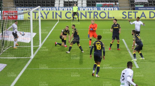 271020 - Swansea City v Stoke City, Sky Bet Championship -\Stoke players look on as Jay Fulton of Swansea City's shot goes in for the first goal
