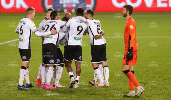 271020 - Swansea City v Stoke City, Sky Bet Championship - Kasey Palmer of Swansea City is congratulated by team mates after scoring the second goal