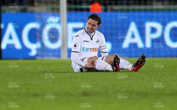 020118 - Swansea City v Tottenham Hotspur - Premier League - Dejected Angel Rangel of Swansea City