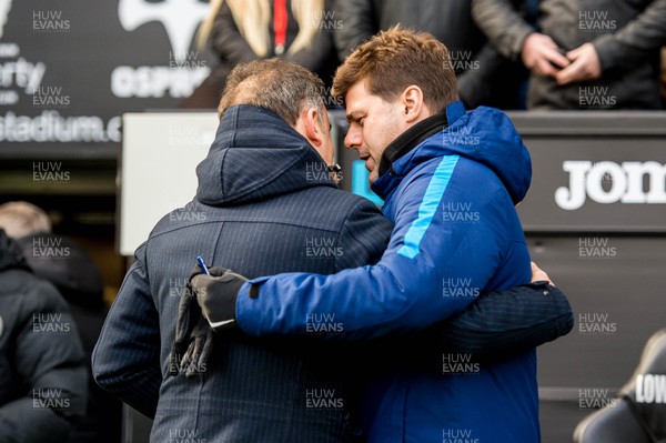 170318 - Swansea City v Tottenham Hotspur, FA CUP - Carlos Carvalhal, Manager of Swansea City shakes hands with Mauricio Pochettino Manager of Tottenham Hotspur  ahead of the game 