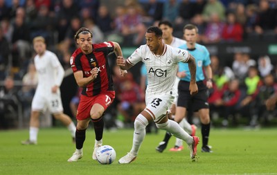 010926 Swansea City v Watford, EFL Sky Bet Championship - Adam Idah of Swansea City takes on Iker Bravo of Watford
