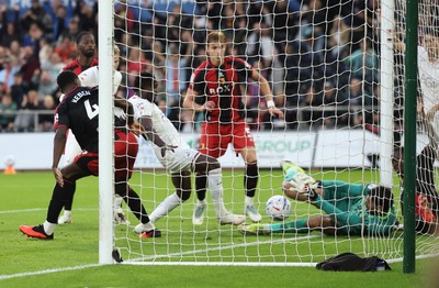 010926 Swansea City v Watford, EFL Sky Bet Championship - Watford goalkeeper Federico Ravaglia saves at the feet of Joseph Opoku of Swansea City