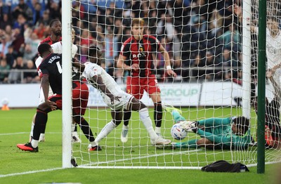 010926 Swansea City v Watford, EFL Sky Bet Championship - Watford goalkeeper Federico Ravaglia saves at the feet of Joseph Opoku of Swansea City