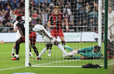 010926 Swansea City v Watford, EFL Sky Bet Championship - Watford goalkeeper Federico Ravaglia saves at the feet of Joseph Opoku of Swansea City