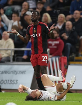 010926 Swansea City v Watford, EFL Sky Bet Championship - Ji-Sung Eom of Swansea City is brought down by Omar Haktab Traore of Watford