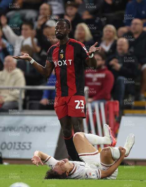 010926 Swansea City v Watford, EFL Sky Bet Championship - Ji-Sung Eom of Swansea City is brought down by Omar Haktab Traore of Watford
