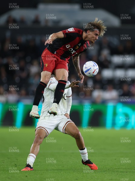 010926 Swansea City v Watford, EFL Sky Bet Championship - Iker Bravo of Watford and Filip Lissah of Swansea City compete for the ball