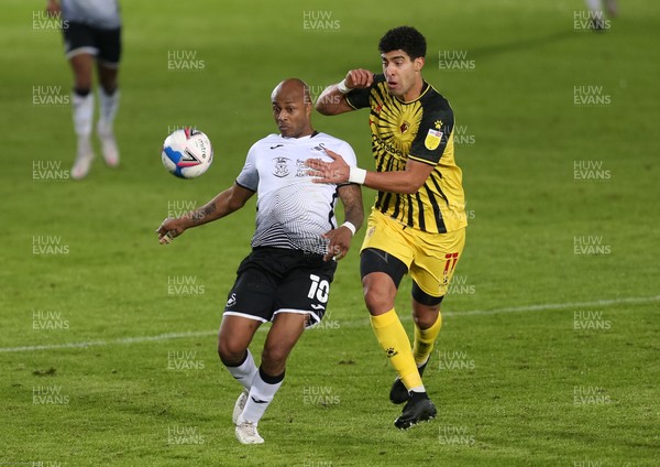 020121 - Swansea City v Watford, Sky Bet Championship - Andre Ayew of Swansea City and Adam Masina of Watford compete for the ball