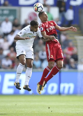 230917 - Swansea City v Watford, Premier League - Kyle Naughton of Swansea City and Richarlison of Watford compete for the ball