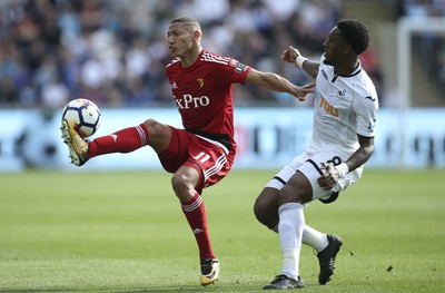 230917 - Swansea City v Watford, Premier League - Richarlison of Watford clears under pressure from Leroy Fer of Swansea City