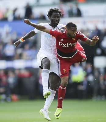 230917 - Swansea City v Watford, Premier League - Wilfried Bony of Swansea City and Adrian Mariappa of Watford compete for the ball